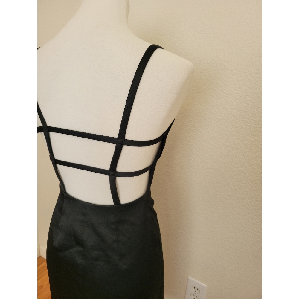 Womens Laundry mini black dress with open back with design. No size tag